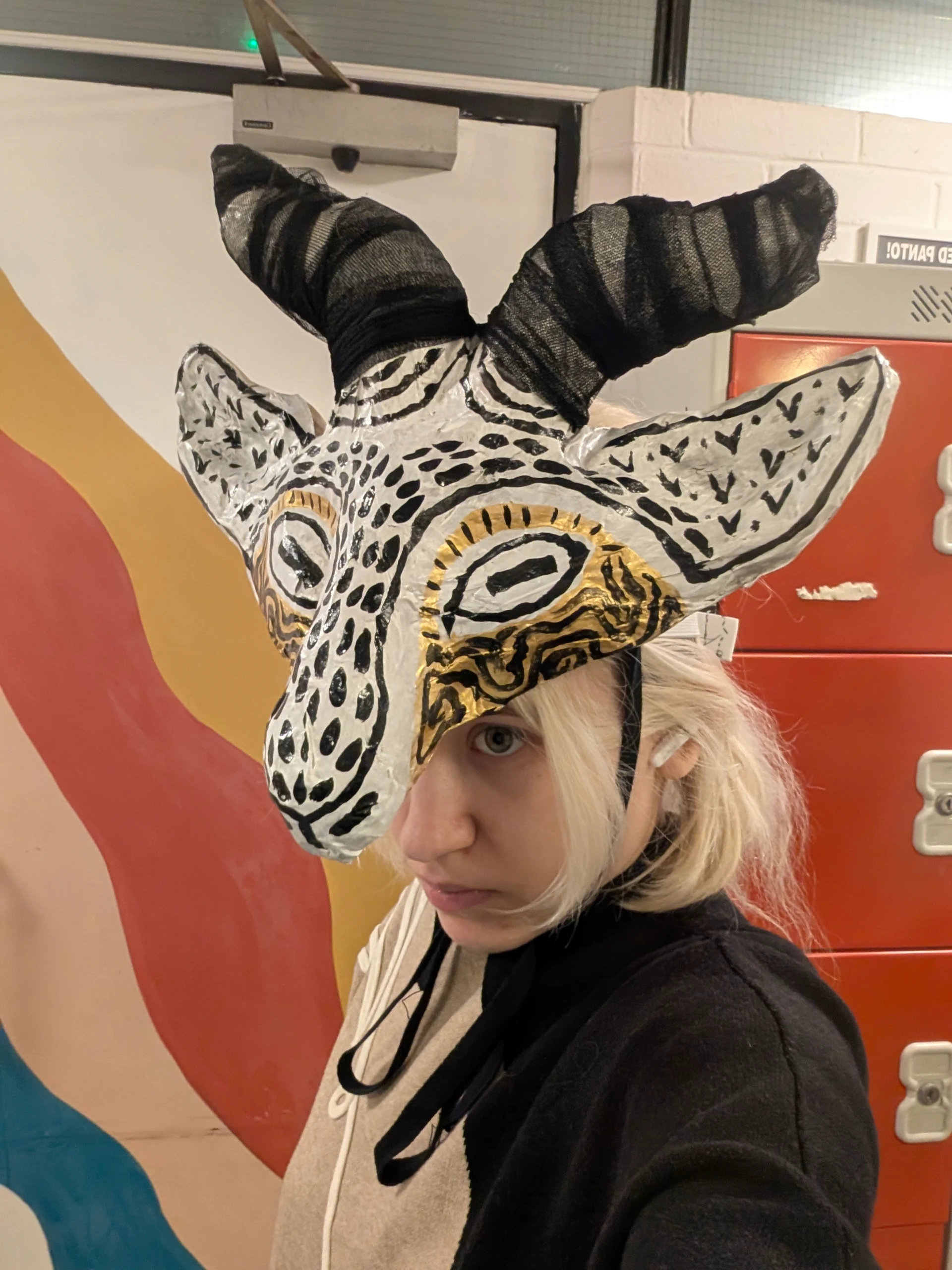 adding papier-mâché layers mesh horns and paint