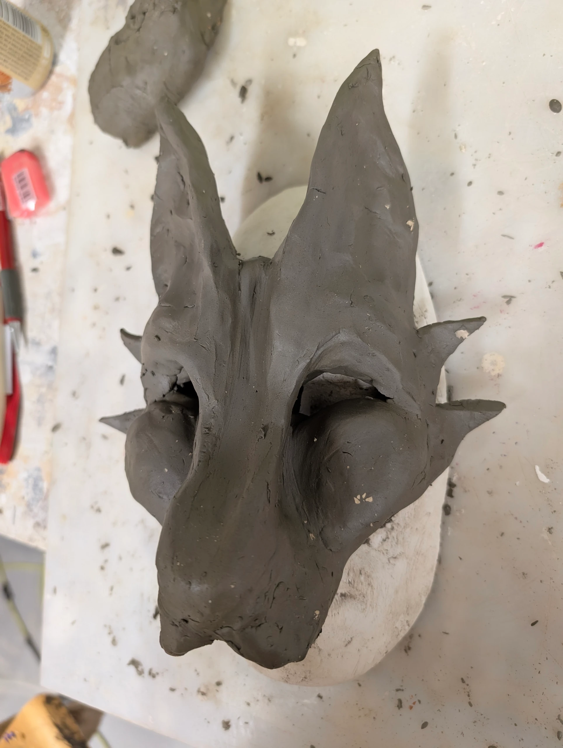 sculpting the clay mask