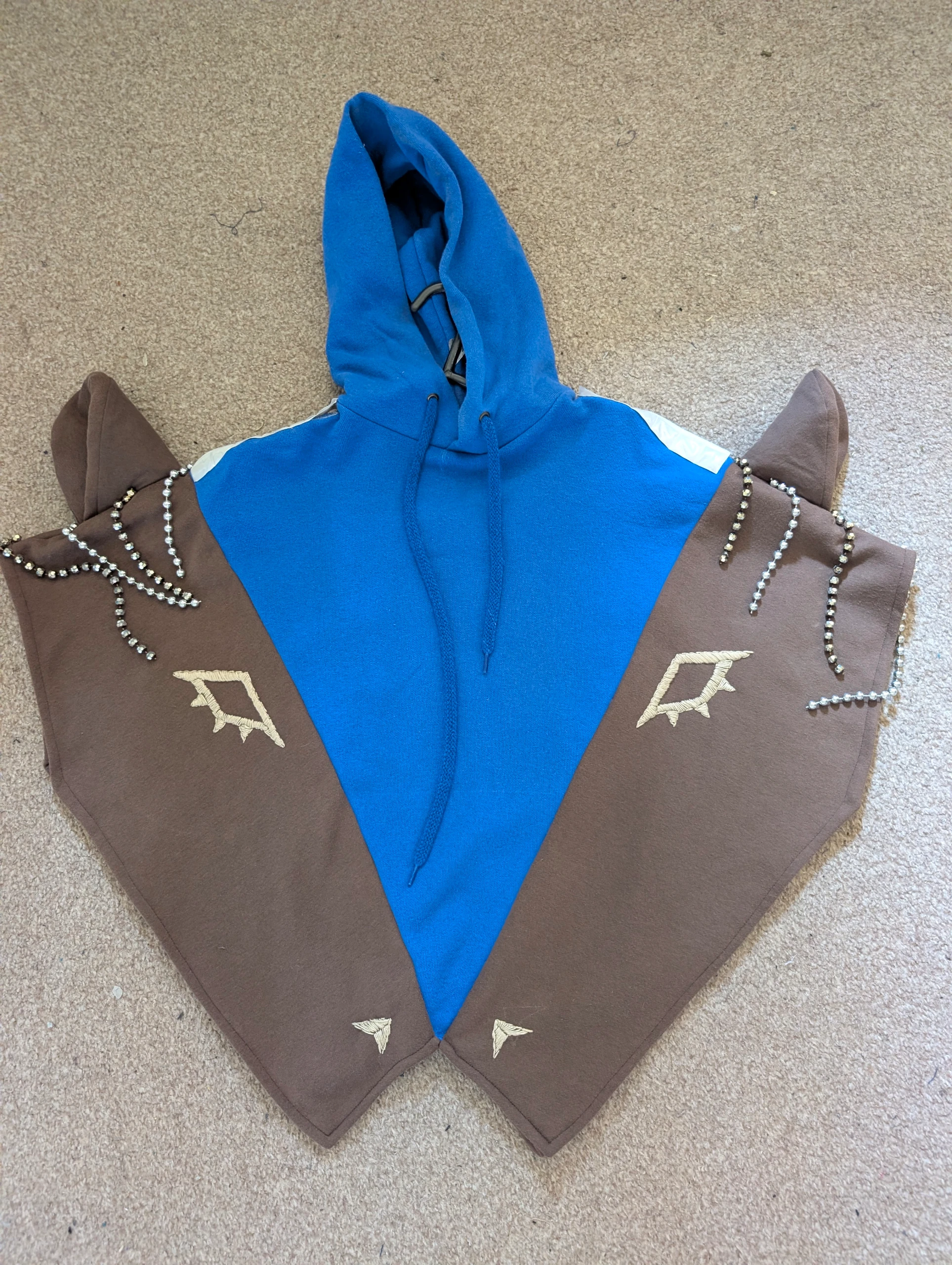 sewing the horse heads poncho